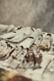 a pile of newspapers sitting on top of a table