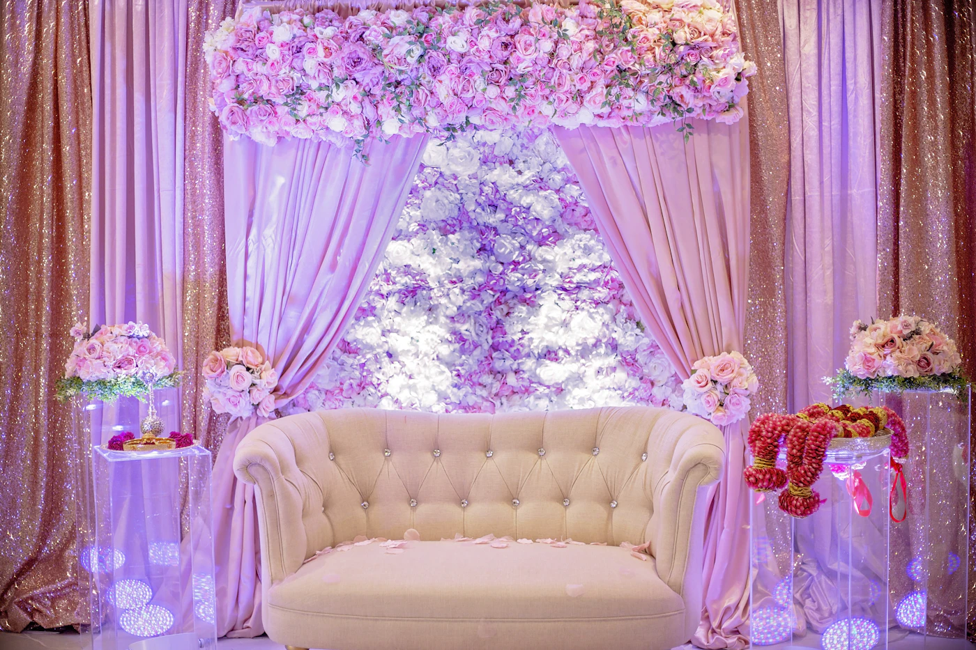 Wedding reception hashtag walls for social media sharing — A large screen displays live guest photos at a wedding reception.