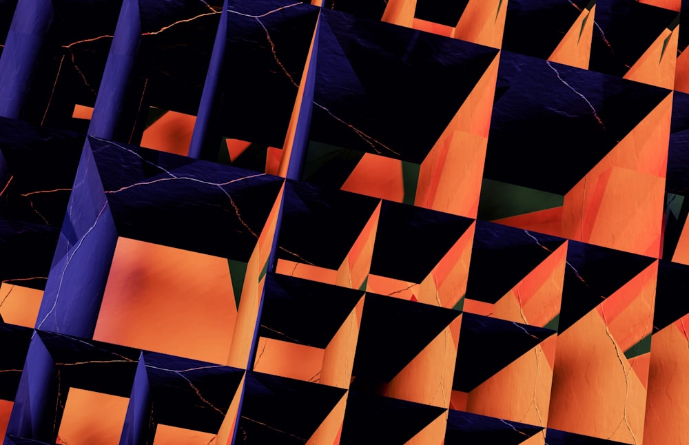 an abstract image of orange and blue shapes