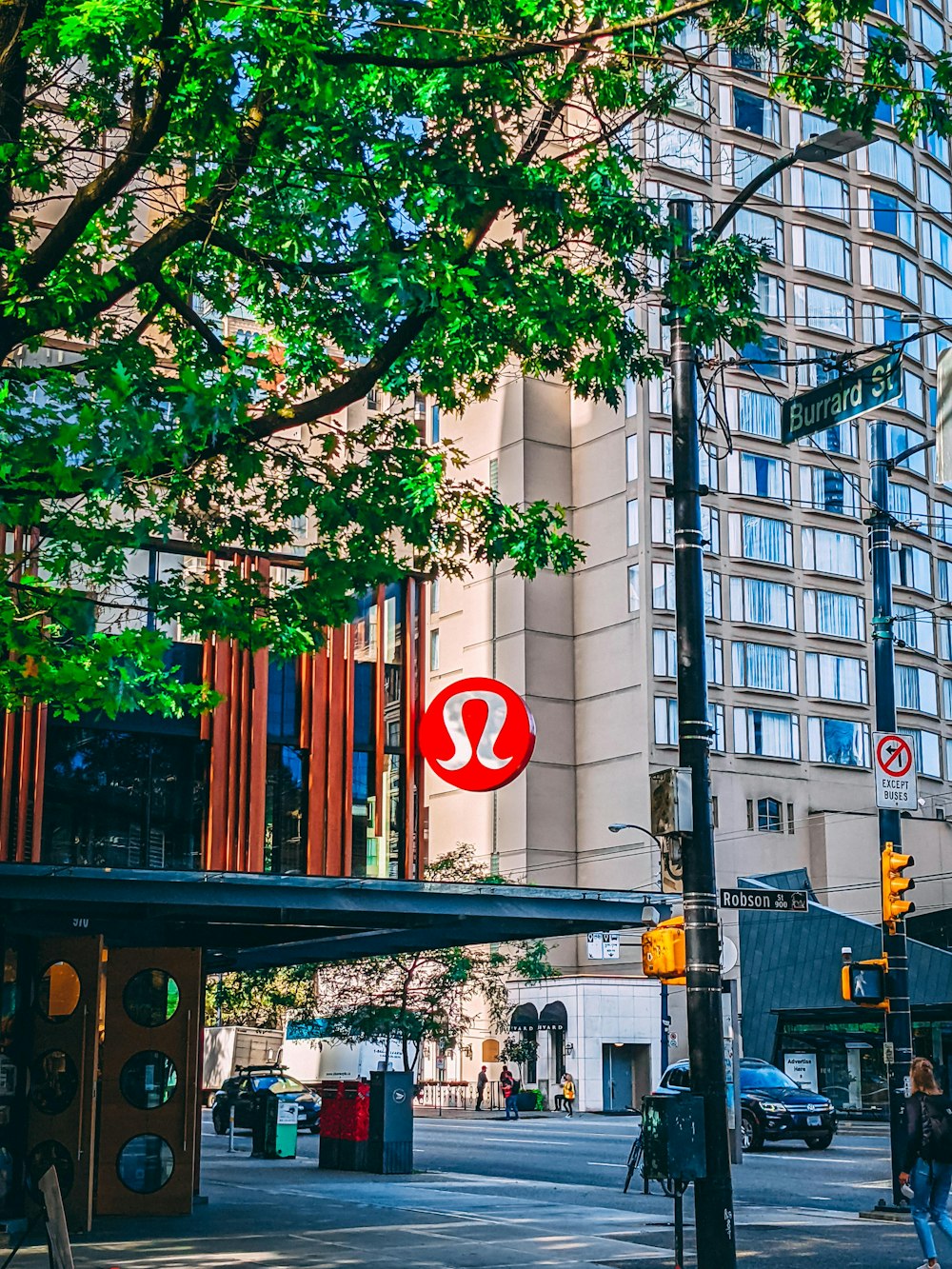 a red sign that is on the side of a building