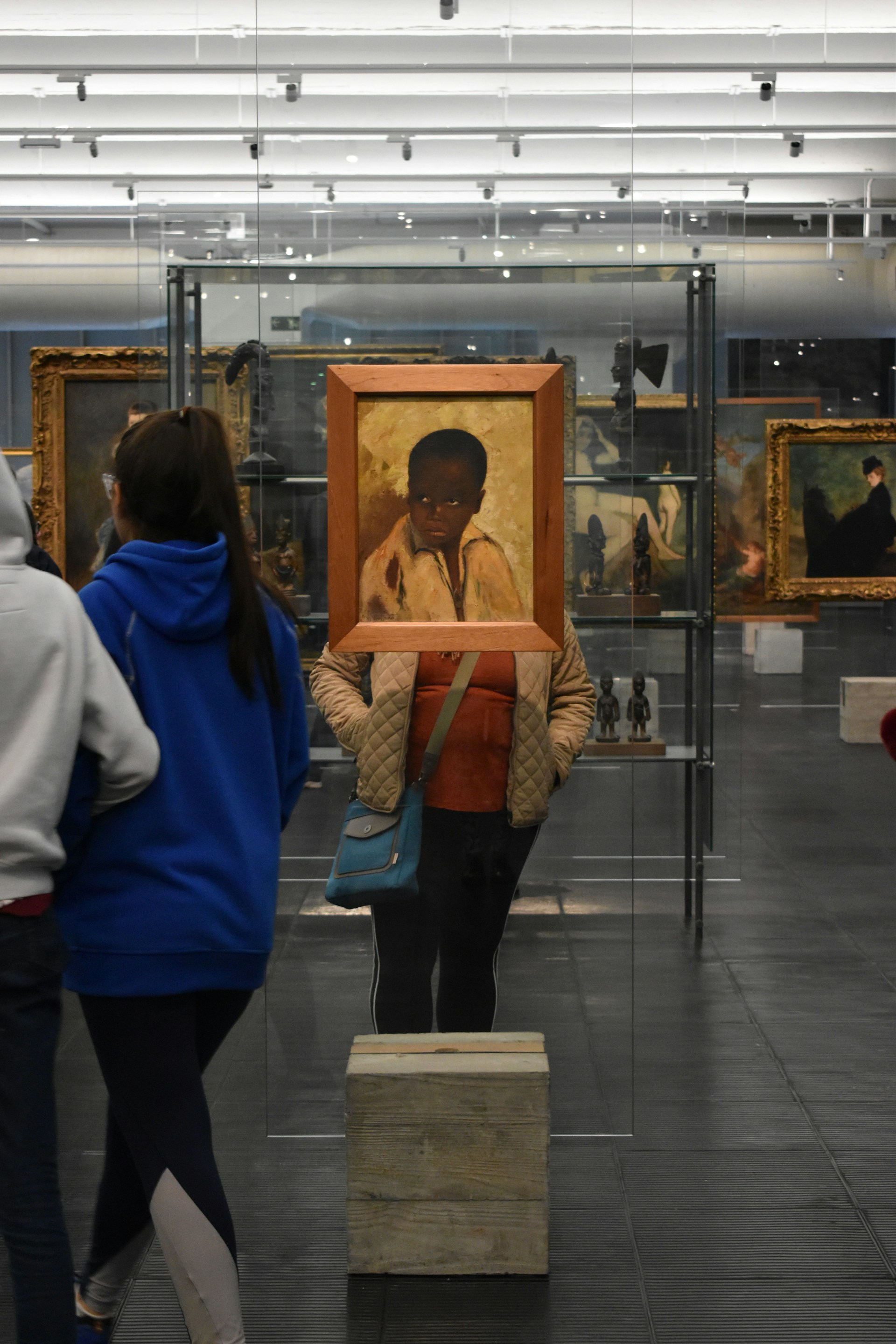 woman wearing yellow long-sleeved dress under white clouds and blue sky during daytime