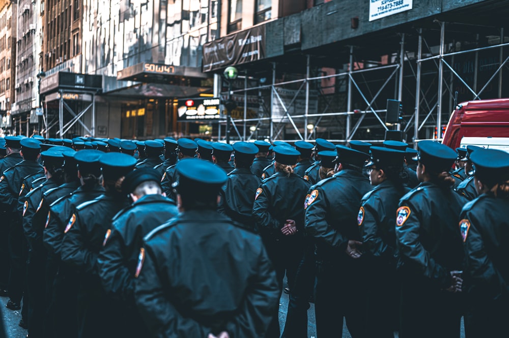 a group of police officers standing in a line