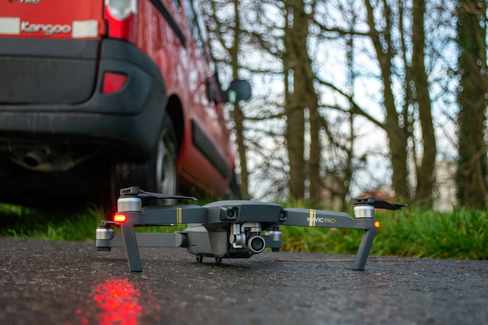 a car is parked next to a remote controlled vehicle