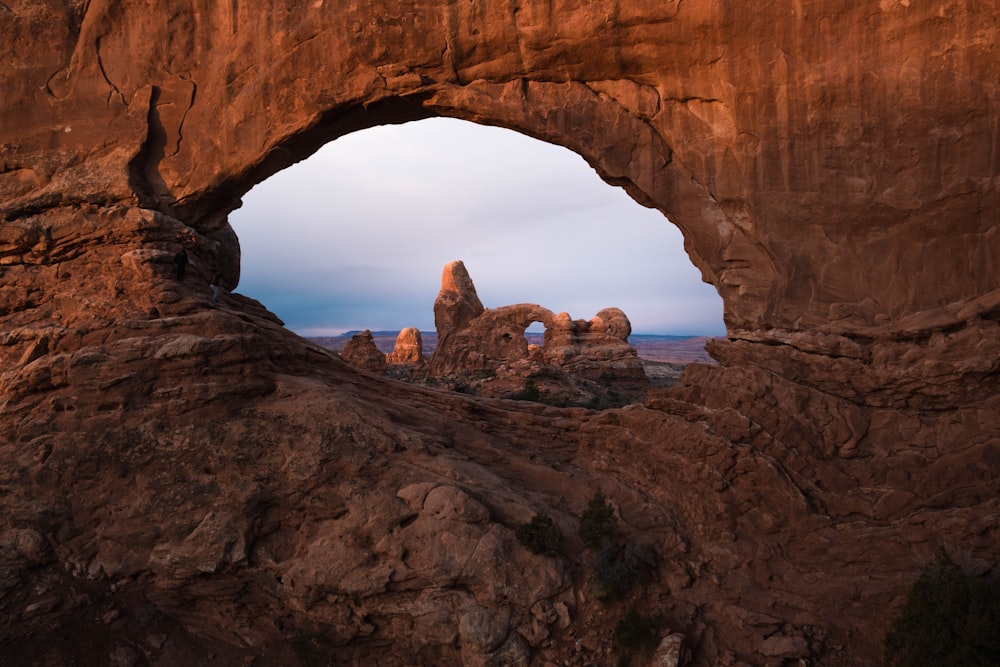 a canyon with Arches National Park in the background