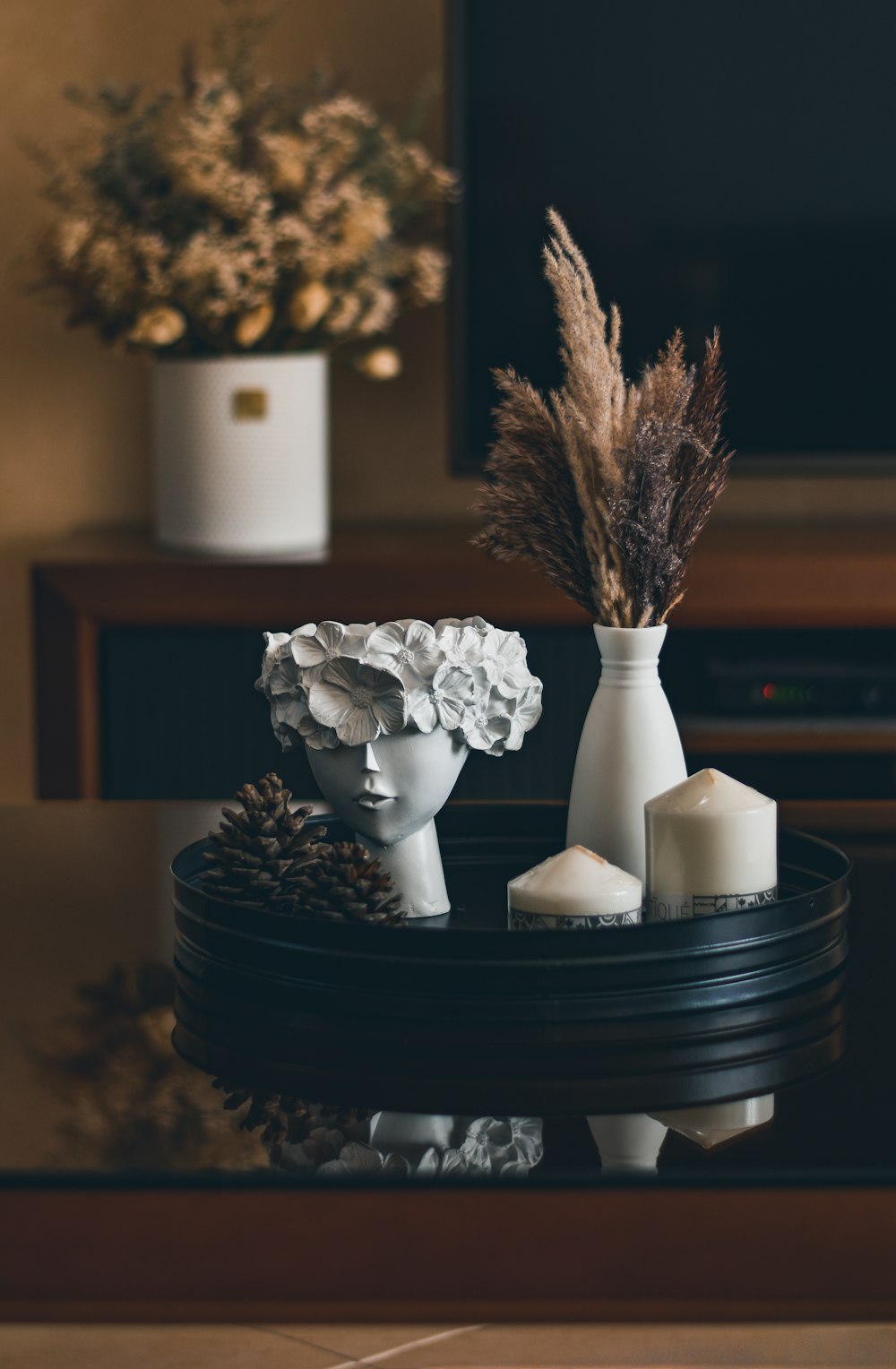 a vase of flowers on a table