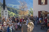 A group of villagers participating in a community meeting.