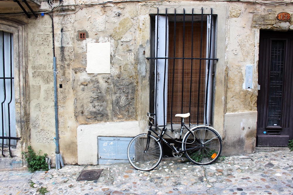 a bicycle parked in front of a building