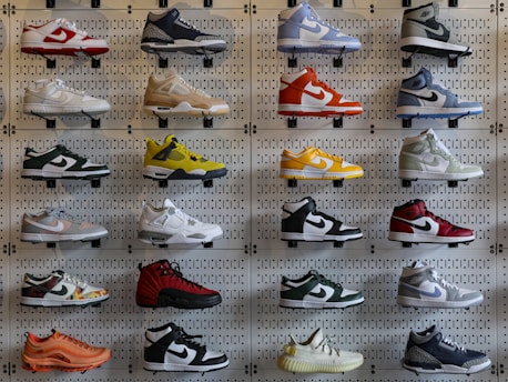 A stylish sneaker display featuring various Nike models in vibrant colors.