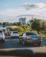 a bunch of cars that are sitting in the street