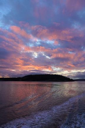 A stunning sunset over the island's landscape.