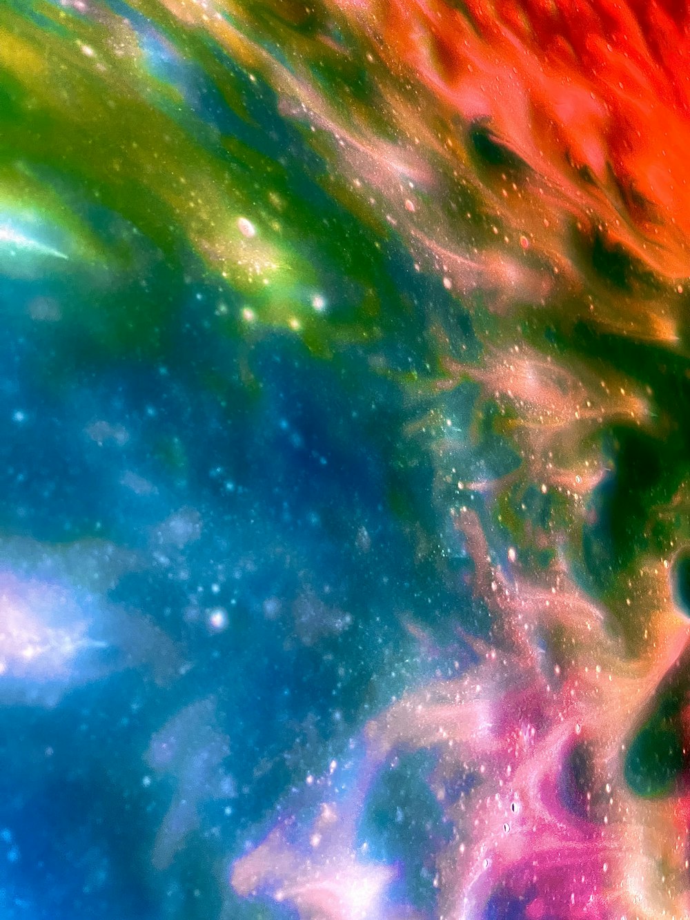 a colorful space filled with stars and dust