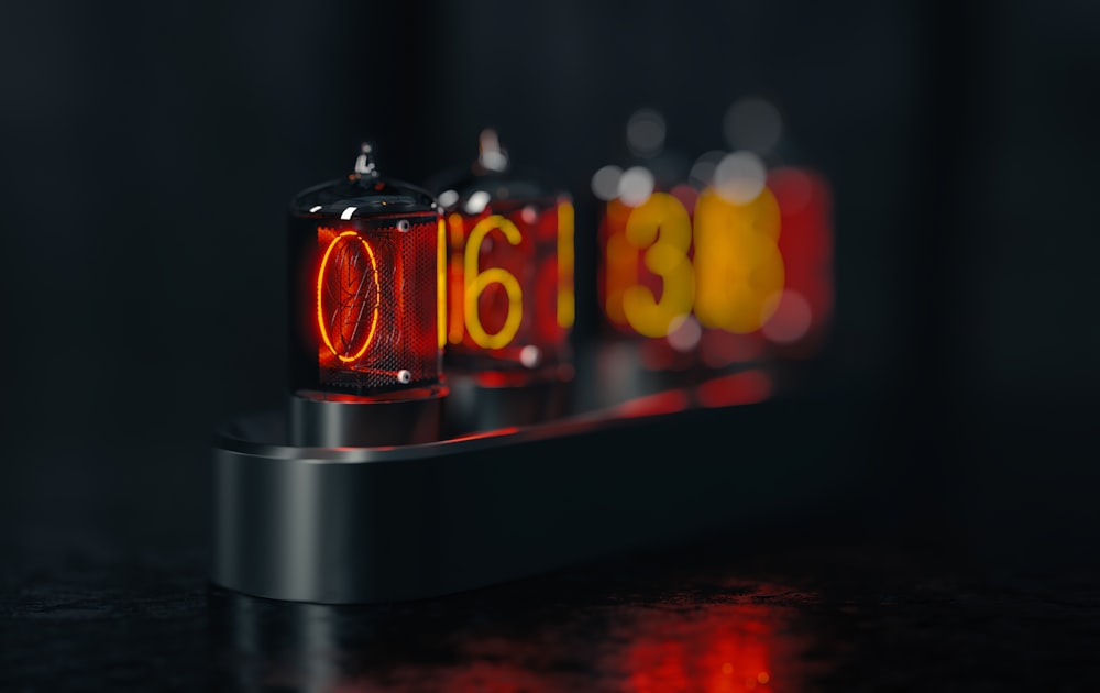 a close up of a clock on a table