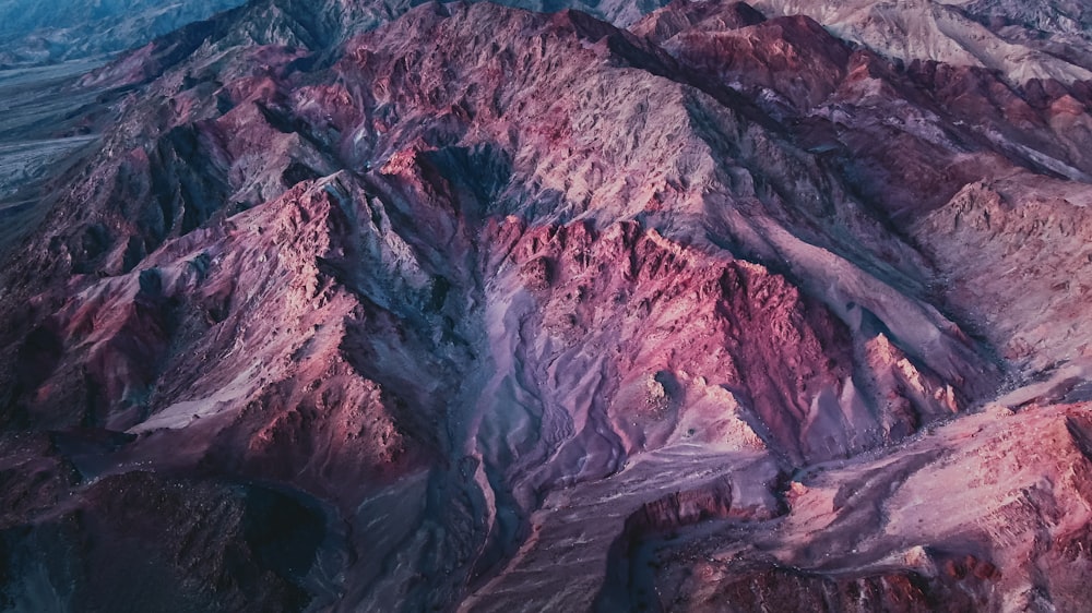 an aerial view of a mountain range in the desert