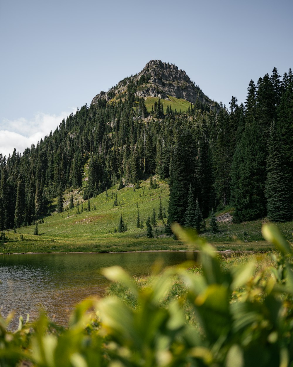 a mountain with a lake in front of it