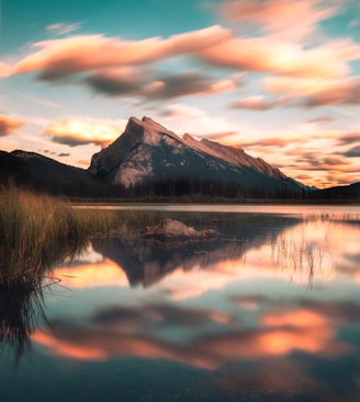 a lake with a mountain in the background