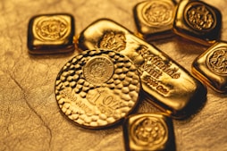 a group of gold bars sitting on top of a table