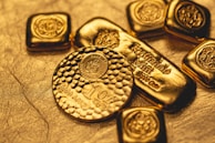 a group of gold bars sitting on top of a table