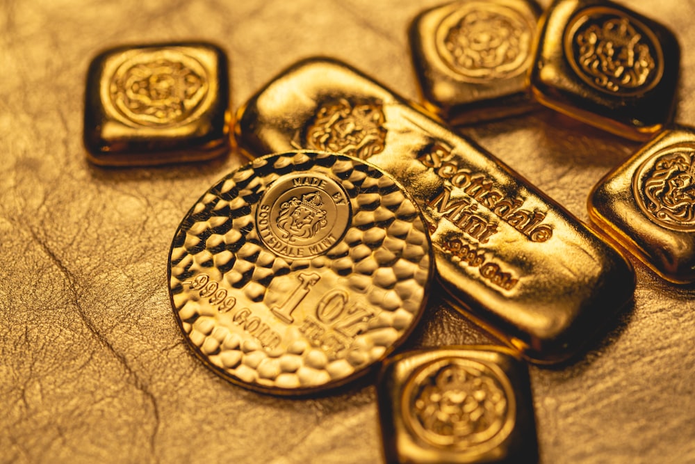 a group of gold bars sitting on top of a table