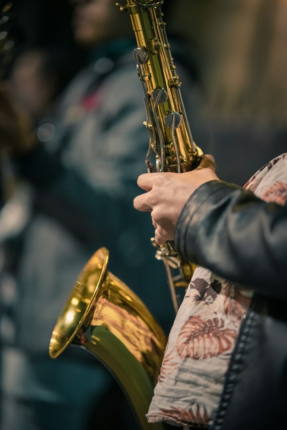 a close up of a person playing a saxophone