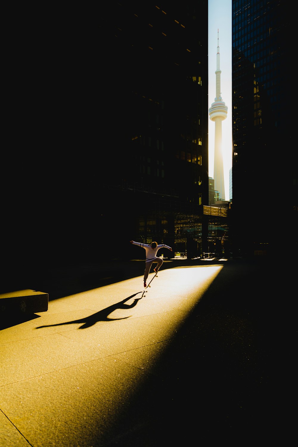 a person riding a skateboard on a city street