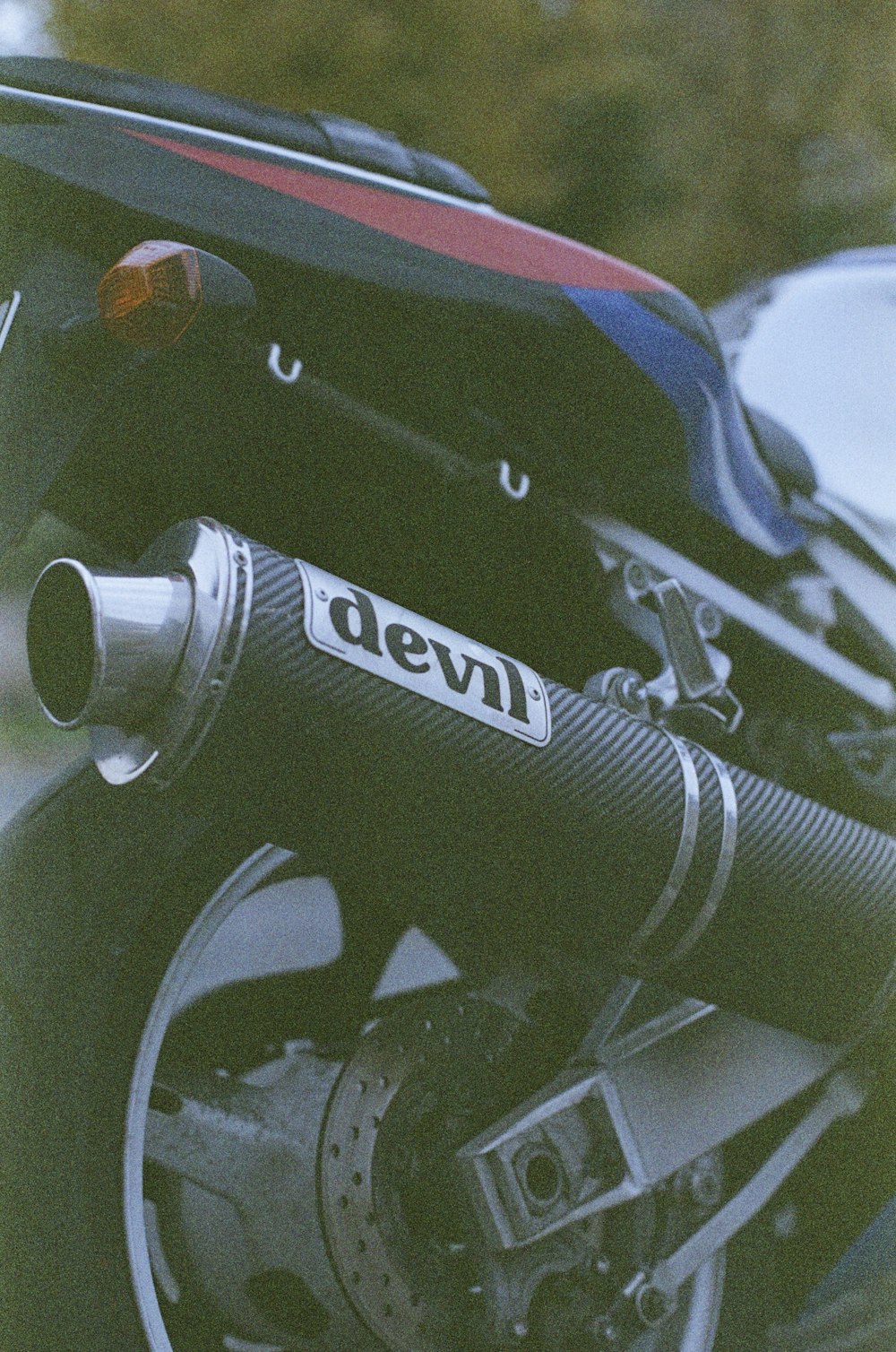 a close up of a motorcycle's exhaust system