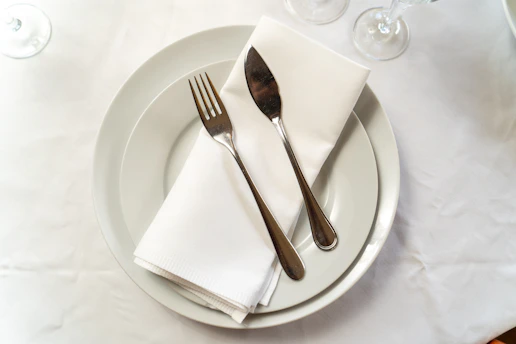 a silver spoon sitting on a table
