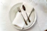 a silver spoon sitting on a table