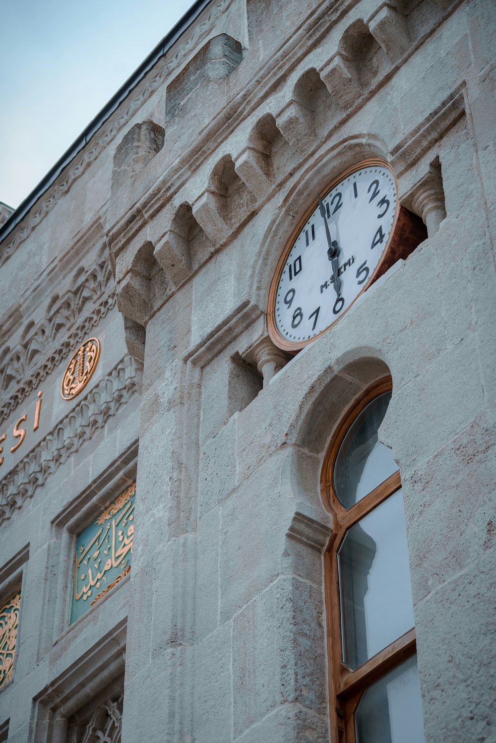 a clock on the side of a building