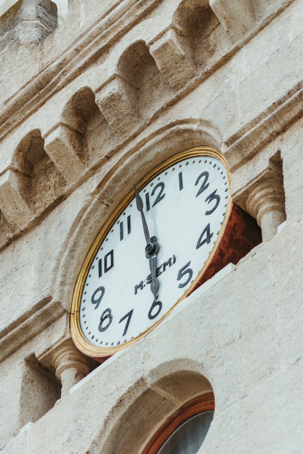 a large clock on the side of a building