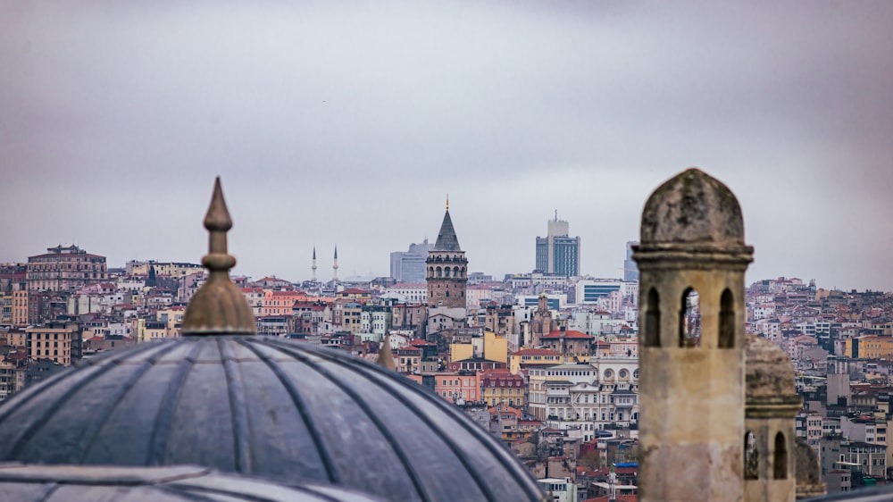 a view of a city from a rooftop of a building