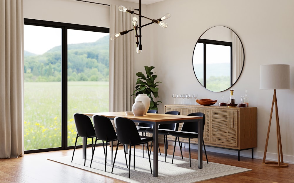 a dining room table in front of a window