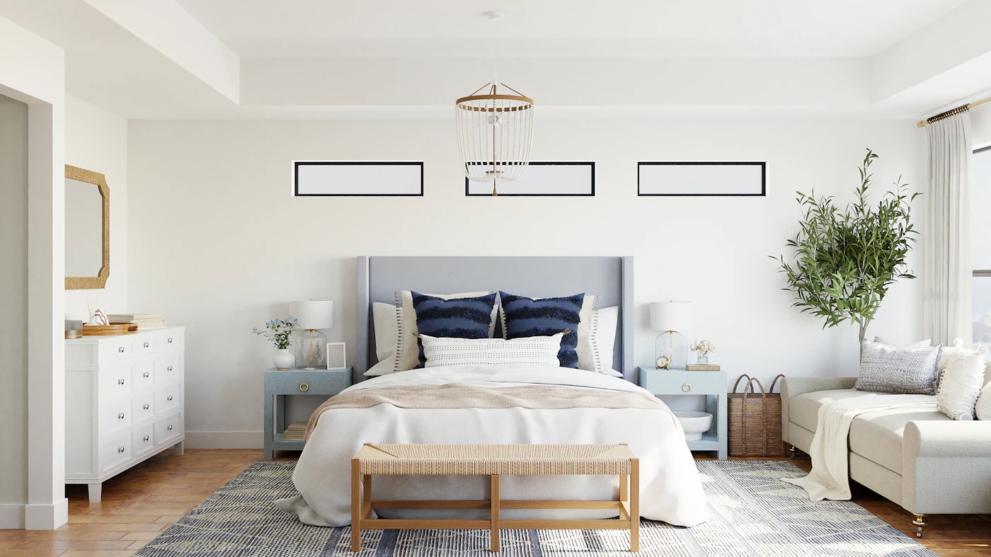 Bedroom suite inside a barndominium with warm neutral finishes