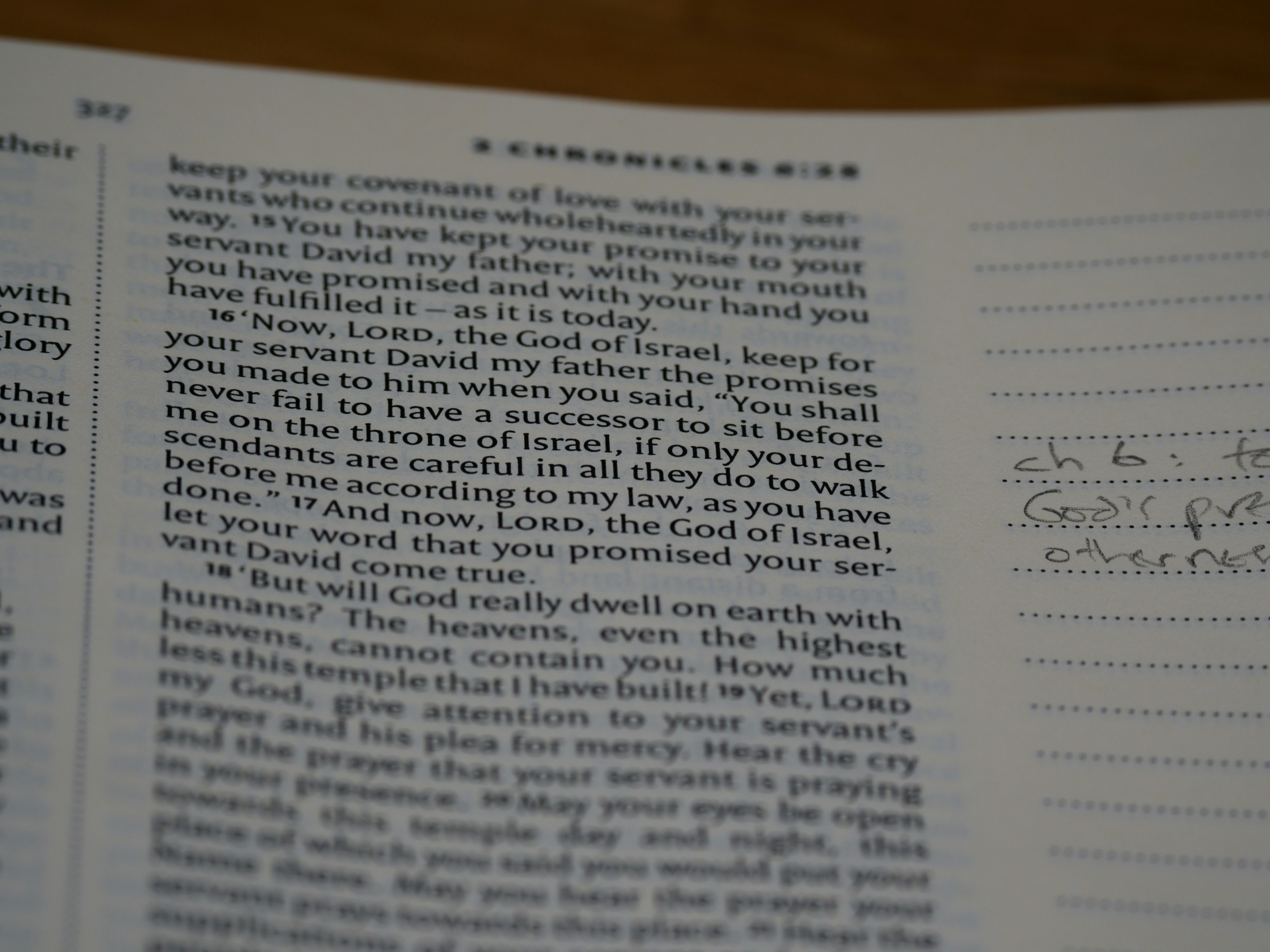 a close up of a book with writing on it