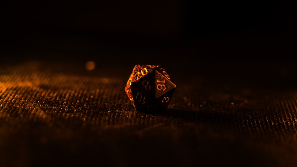 a close up of a dice on a table