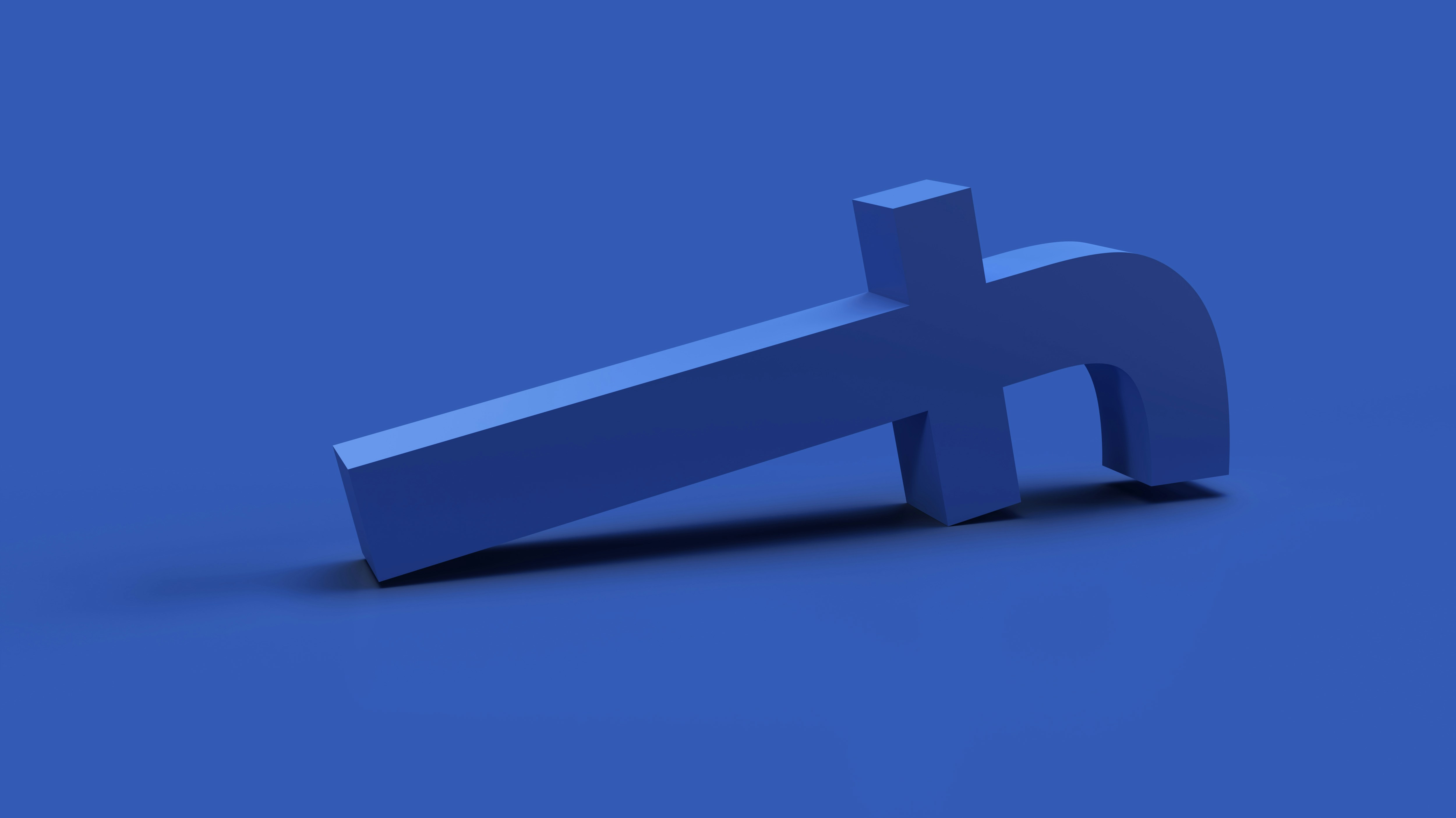3d render the blue symbol facebook has fallen and is lying,the collapse of the blue symbol facebook, background for news blue background