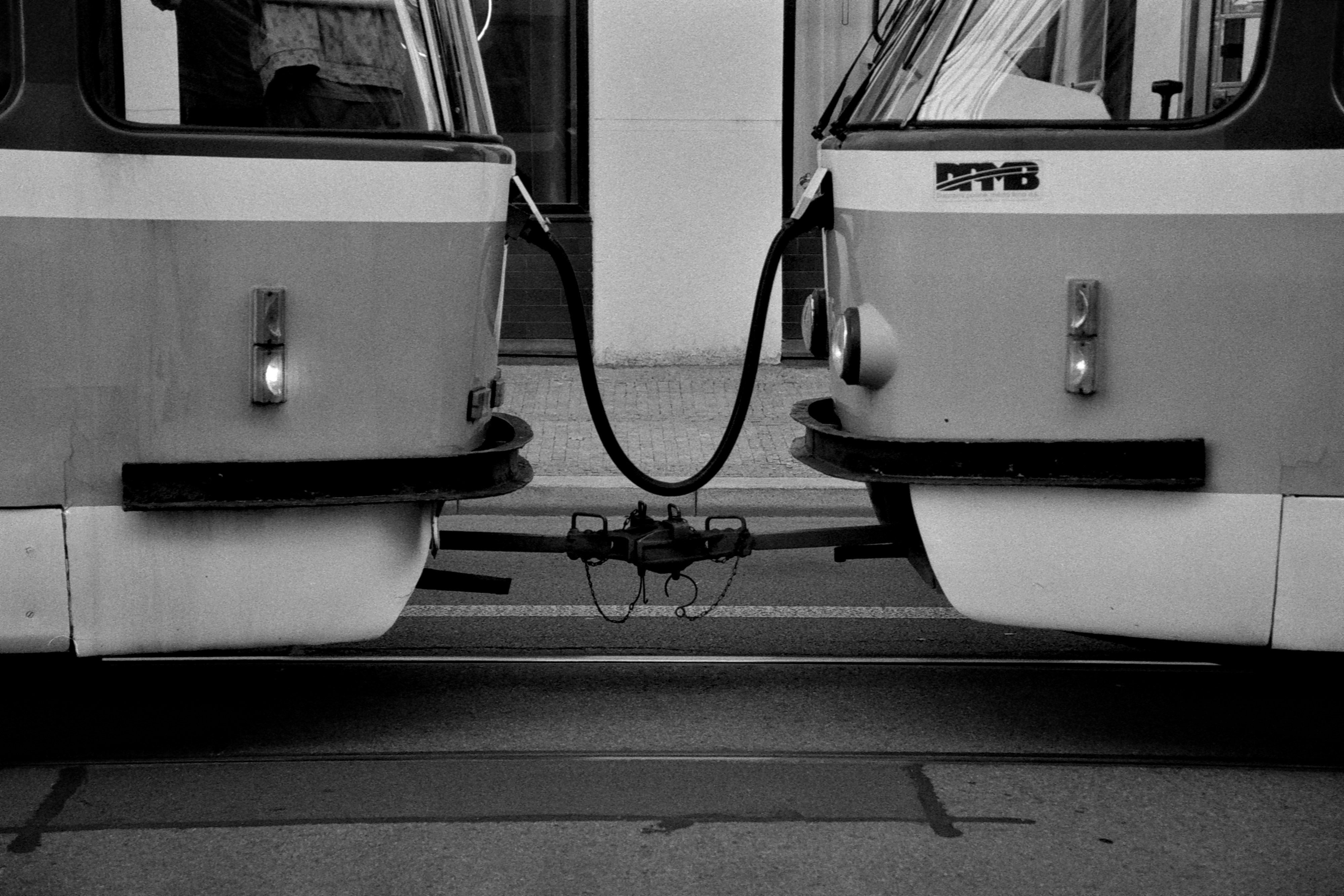 a couple of buses parked next to each other