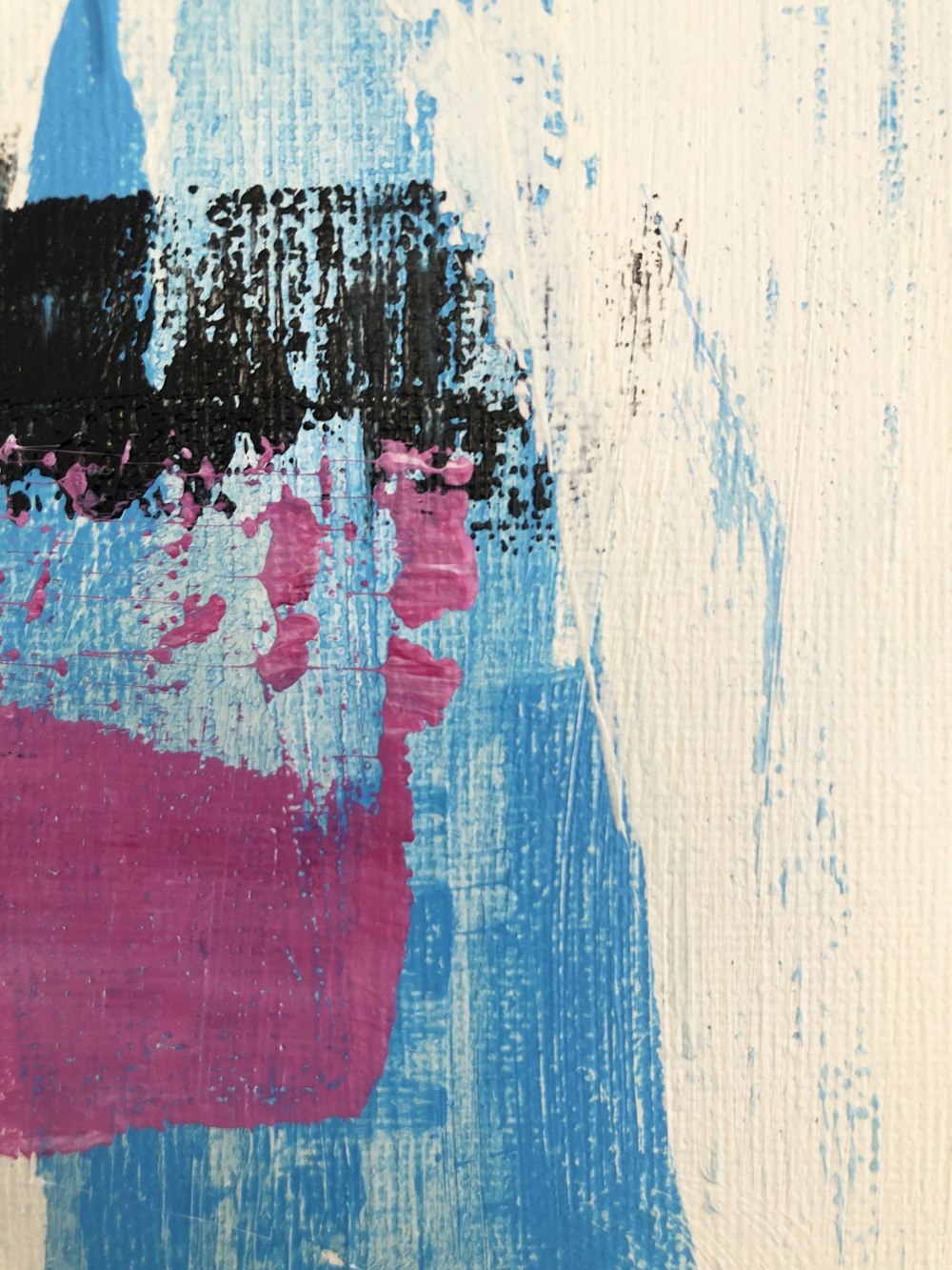 a painting with blue and pink paint on it