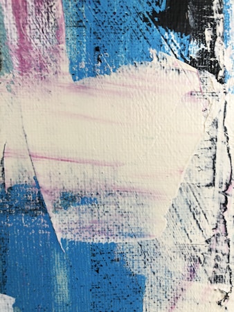 An abstract painting with textured brushstrokes, predominantly featuring shades of blue, white, and pink. The composition consists of streaks and patches of color layered over a canvas, creating a sense of depth and movement.