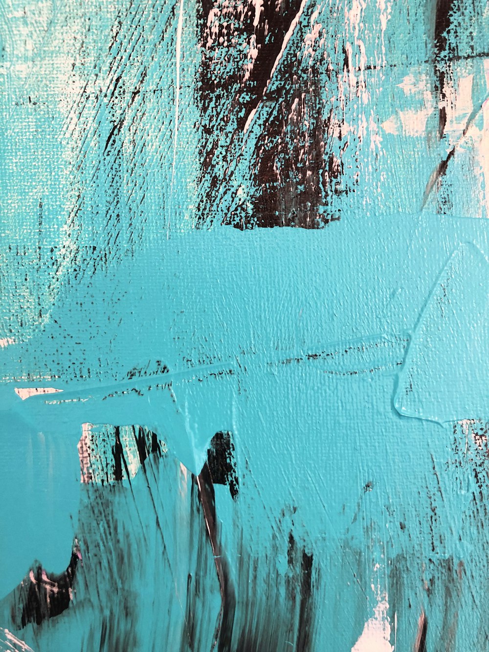 an abstract painting of blue and brown colors