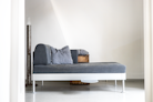 a couch that is sitting in the middle of a room