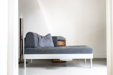 a couch that is sitting in the middle of a room