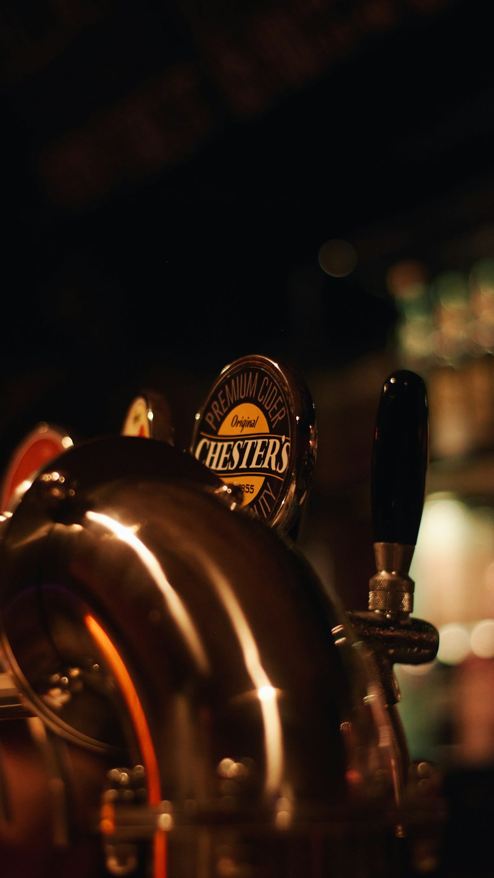 a close up of a beer tapper with a beer