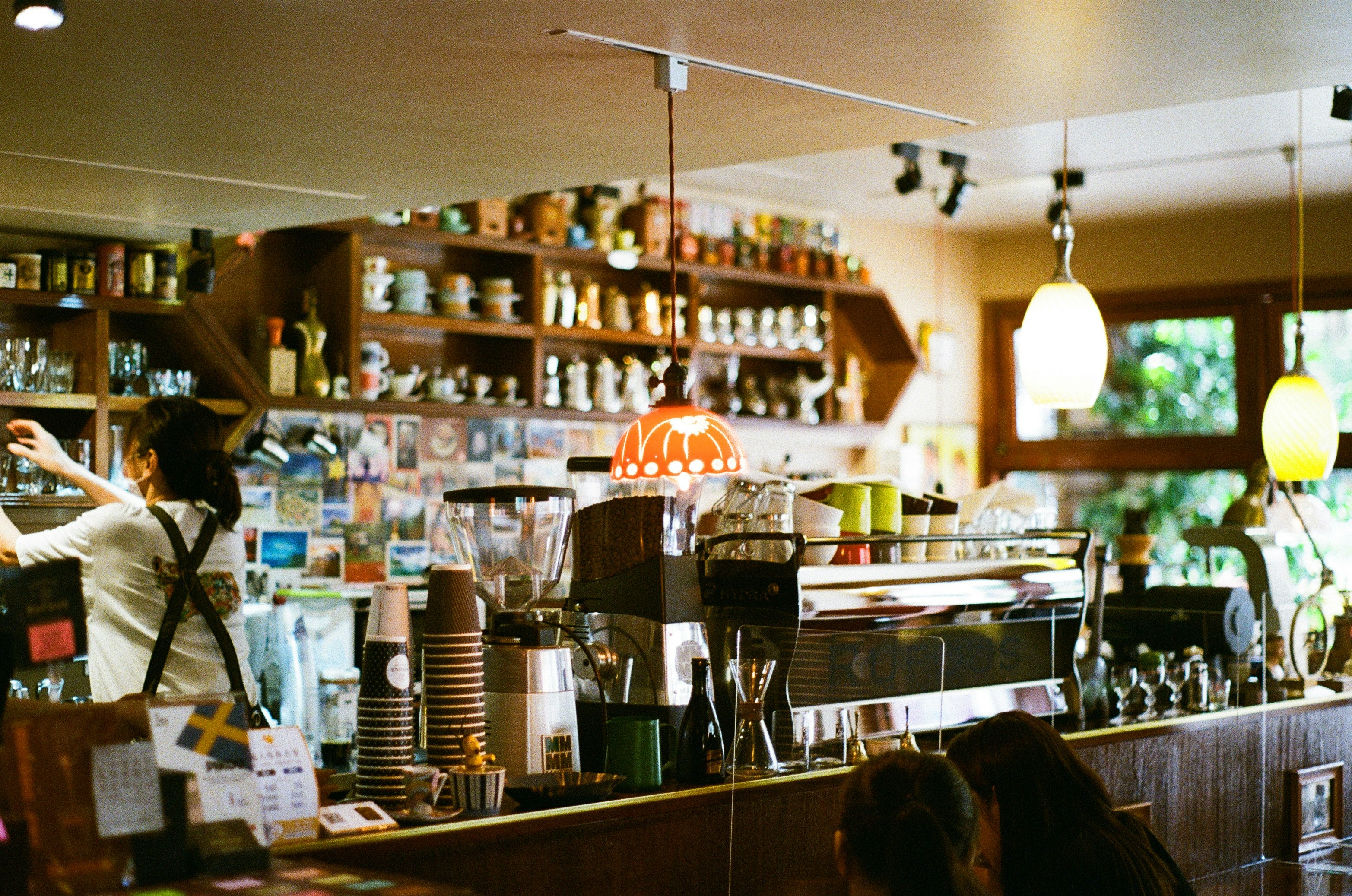 Coffee and pastries in a sunlit Uptown café, with historic architecture in the background - Uptown Chicago coffee shops