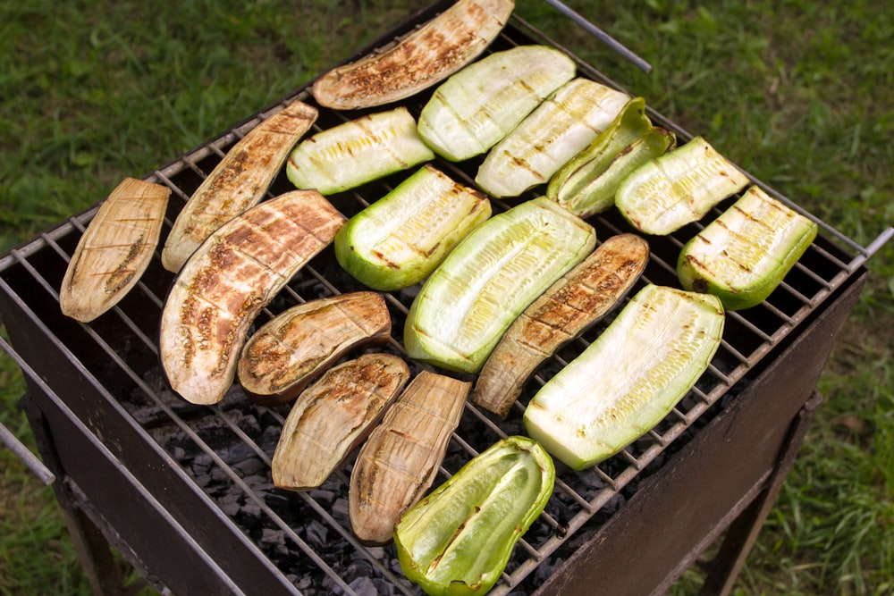 a grill that has a bunch of food on it