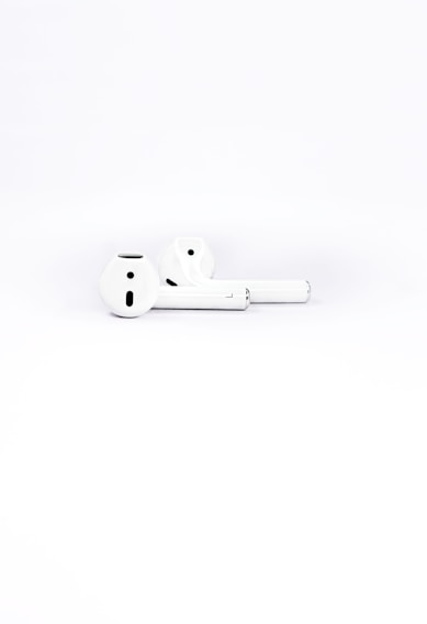 A sleek pair of wireless earbuds showcasing a minimalist design.
