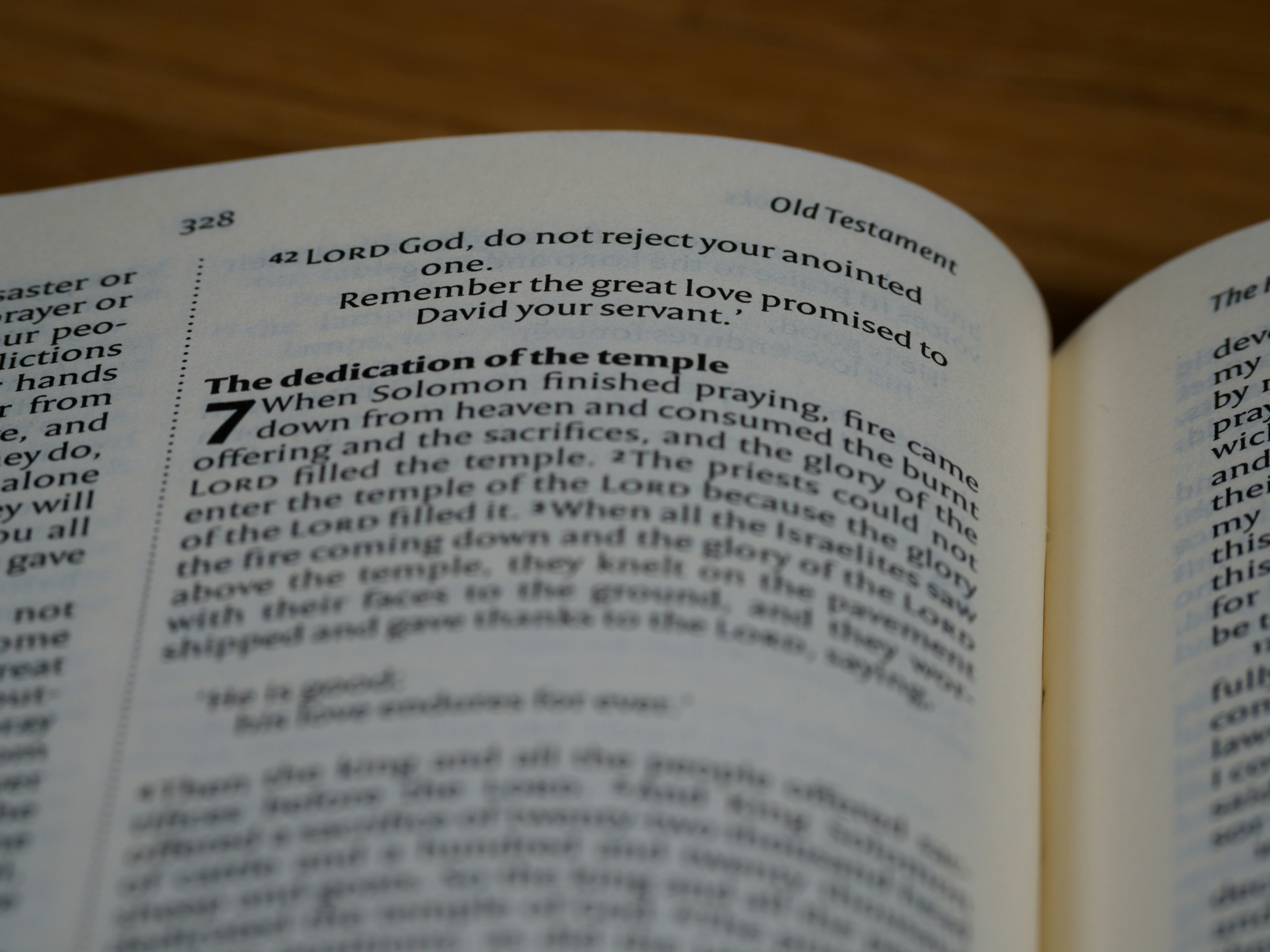 a close up of an open book on a table