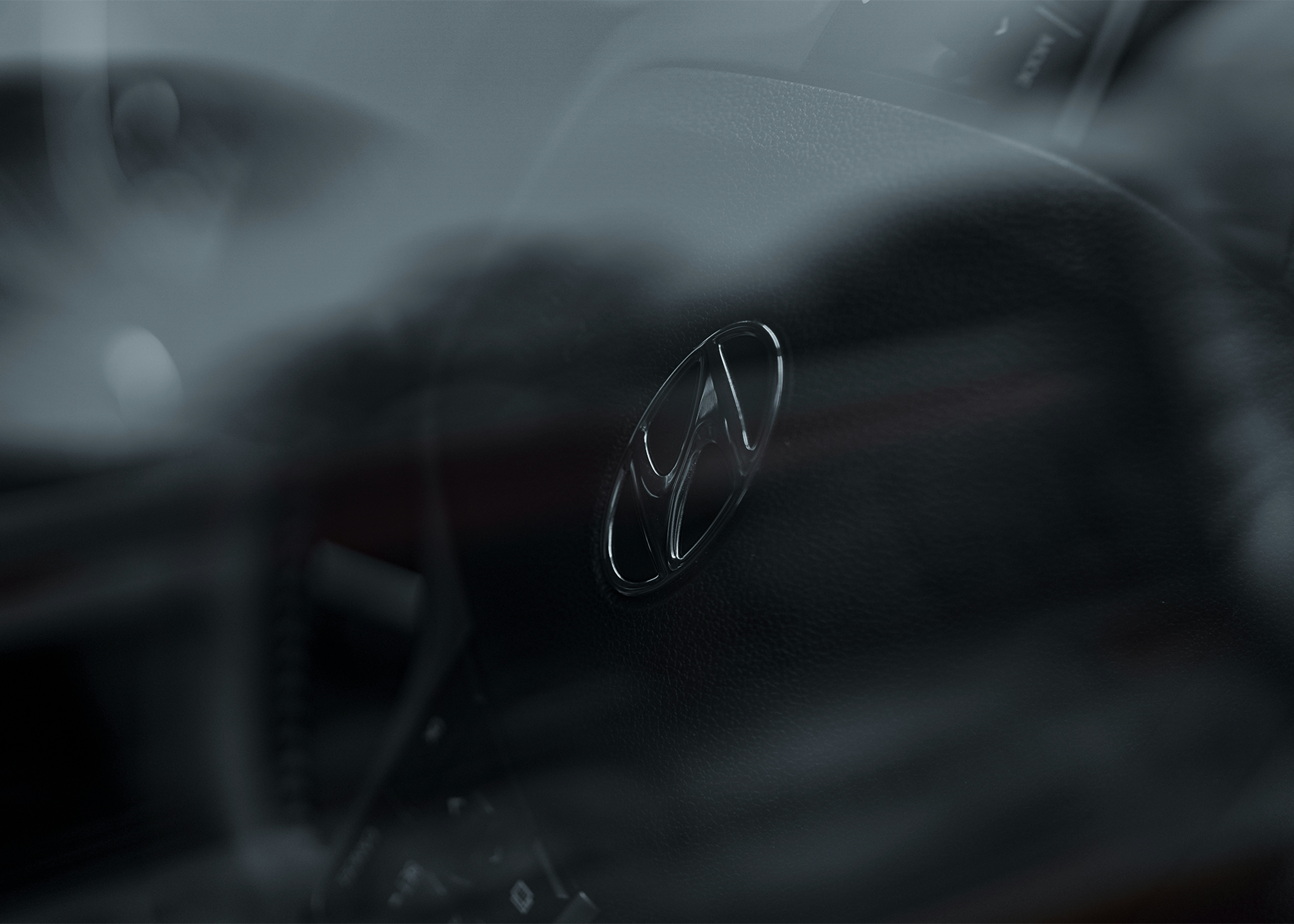 a steering wheel and dashboard of a car