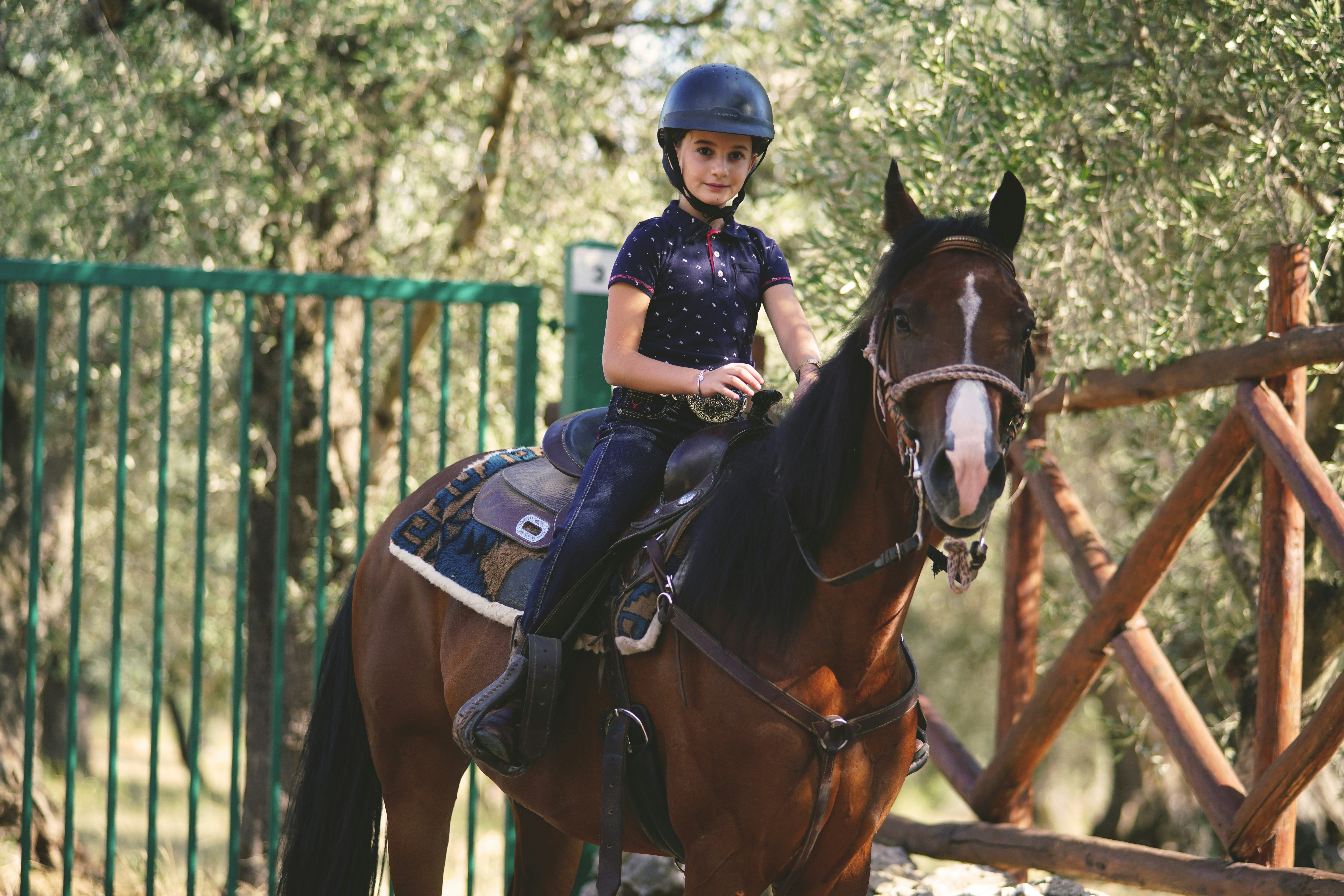 Proper helmet fitting demonstration on child