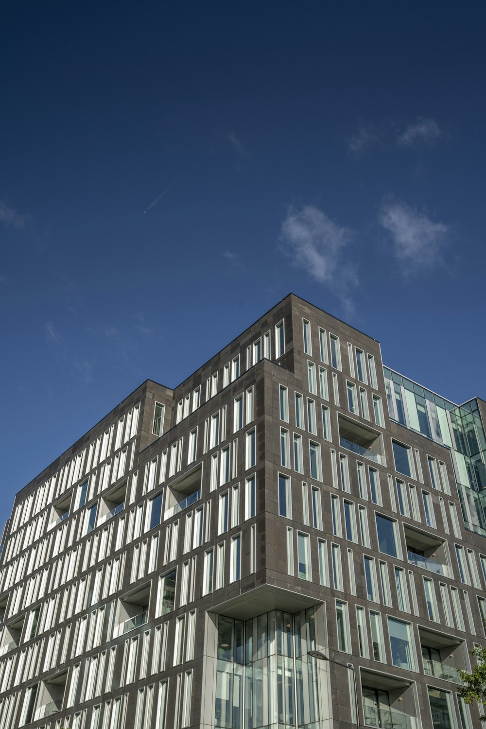 a tall building with lots of windows on top of it