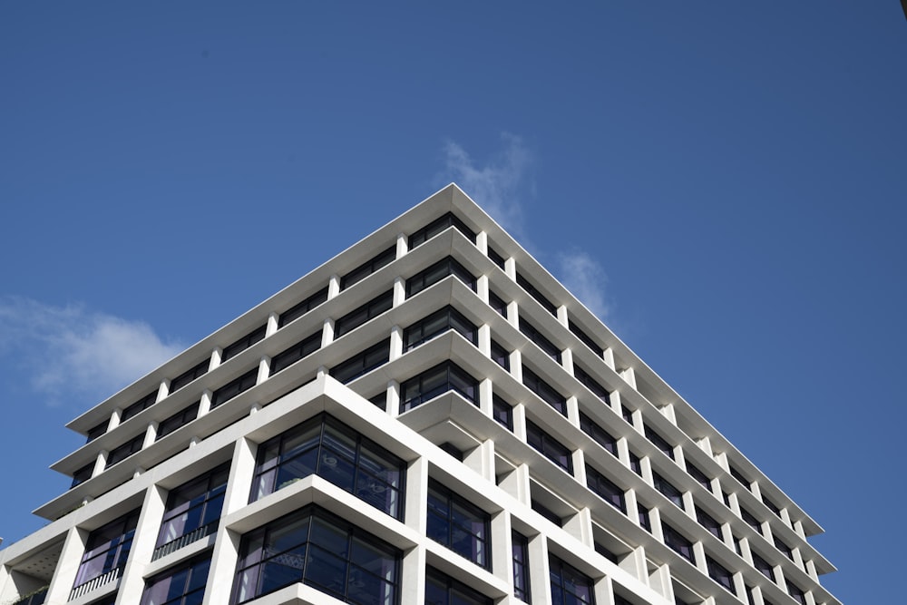 a very tall building with a sky in the background